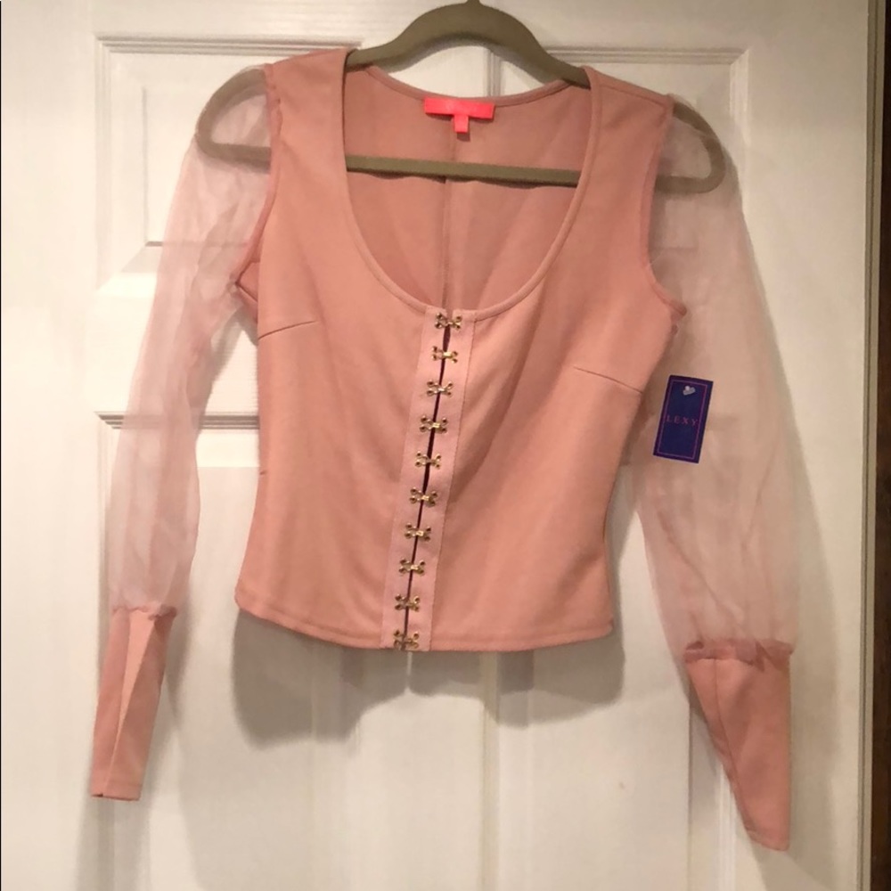 Pink shirt with sheer sleeves